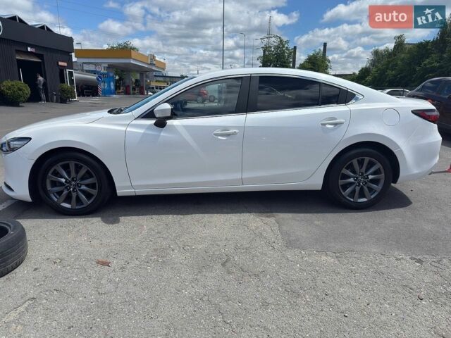 Білий Мазда 6, об'ємом двигуна 2 л та пробігом 158 тис. км за 13470 $, фото 1 на Automoto.ua