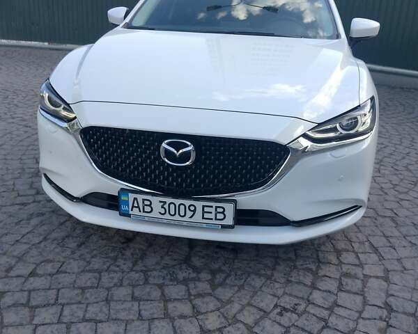 Белый Мазда 6, объемом двигателя 2 л и пробегом 130 тыс. км за 16300 $, фото 1 на Automoto.ua