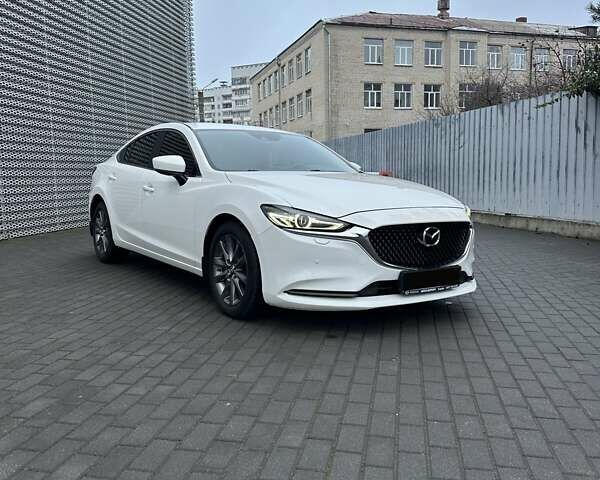Белый Мазда 6, объемом двигателя 2.49 л и пробегом 122 тыс. км за 19500 $, фото 1 на Automoto.ua