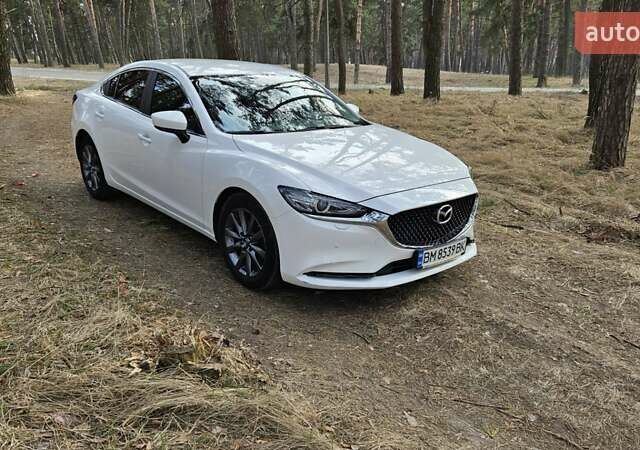 Белый Мазда 6, объемом двигателя 2 л и пробегом 95 тыс. км за 19300 $, фото 1 на Automoto.ua