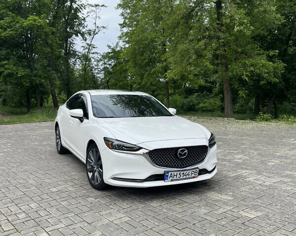Белый Мазда 6, объемом двигателя 2.49 л и пробегом 97 тыс. км за 19500 $, фото 1 на Automoto.ua