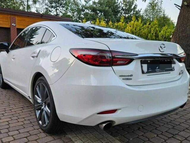 Белый Мазда 6, объемом двигателя 2.5 л и пробегом 112 тыс. км за 11400 $, фото 1 на Automoto.ua
