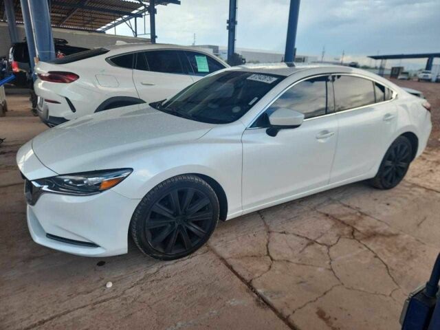 Белый Мазда 6, объемом двигателя 0 л и пробегом 95 тыс. км за 4000 $, фото 1 на Automoto.ua