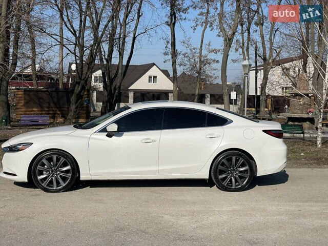 Белый Мазда 6, объемом двигателя 2.49 л и пробегом 240 тыс. км за 16500 $, фото 1 на Automoto.ua