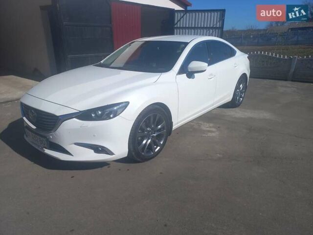 Білий Мазда 6, об'ємом двигуна 2.2 л та пробігом 69 тис. км за 21500 $, фото 1 на Automoto.ua