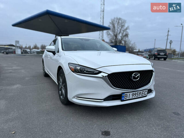 Белый Мазда 6, объемом двигателя 2.49 л и пробегом 92 тыс. км за 16000 $, фото 1 на Automoto.ua