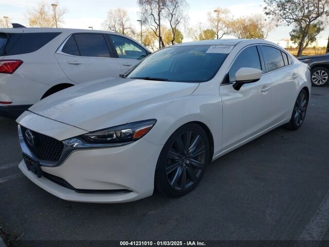 Белый Мазда 6, объемом двигателя 2.5 л и пробегом 123 тыс. км за 12000 $, фото 1 на Automoto.ua