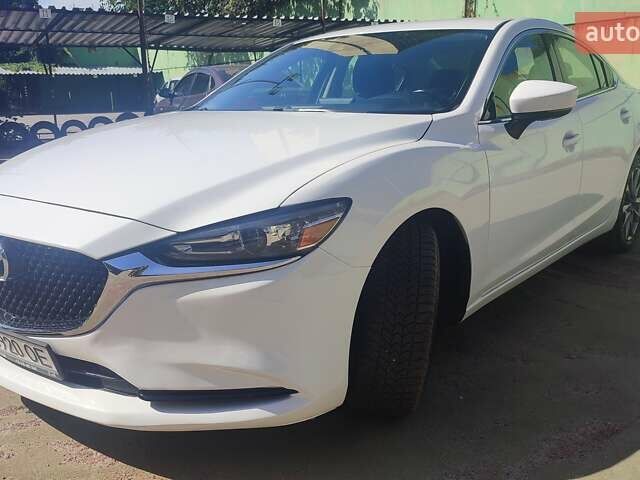 Белый Мазда 6, объемом двигателя 2.49 л и пробегом 100 тыс. км за 16100 $, фото 1 на Automoto.ua