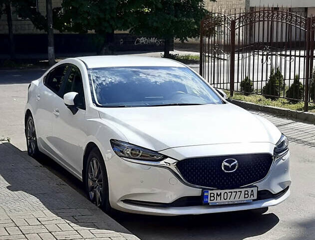 Белый Мазда 6, объемом двигателя 2 л и пробегом 116 тыс. км за 16000 $, фото 1 на Automoto.ua