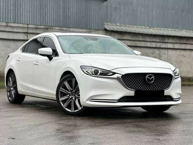 Белый Мазда 6, объемом двигателя 2.5 л и пробегом 95 тыс. км за 13400 $, фото 1 на Automoto.ua