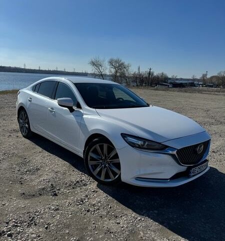 Белый Мазда 6, объемом двигателя 2.49 л и пробегом 99 тыс. км за 24000 $, фото 1 на Automoto.ua