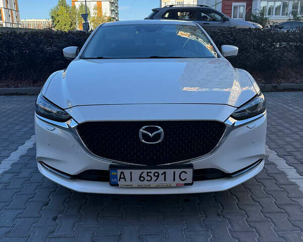 Белый Мазда 6, объемом двигателя 2 л и пробегом 134 тыс. км за 21100 $, фото 1 на Automoto.ua