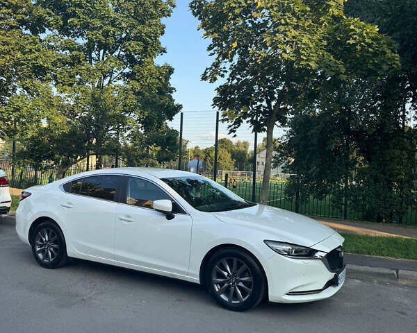 Белый Мазда 6, объемом двигателя 2 л и пробегом 84 тыс. км за 21599 $, фото 1 на Automoto.ua