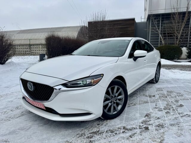 Белый Мазда 6, объемом двигателя 2.5 л и пробегом 70 тыс. км за 15800 $, фото 1 на Automoto.ua