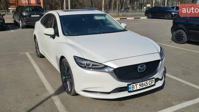 Белый Мазда 6, объемом двигателя 2.49 л и пробегом 60 тыс. км за 23800 $, фото 1 на Automoto.ua