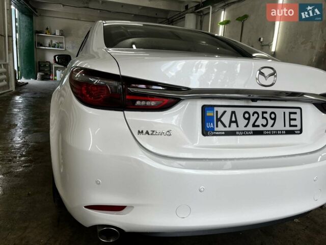 Белый Мазда 6, объемом двигателя 2.49 л и пробегом 58 тыс. км за 25000 $, фото 1 на Automoto.ua