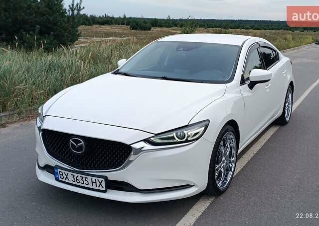 Белый Мазда 6, объемом двигателя 2.49 л и пробегом 70 тыс. км за 16950 $, фото 1 на Automoto.ua