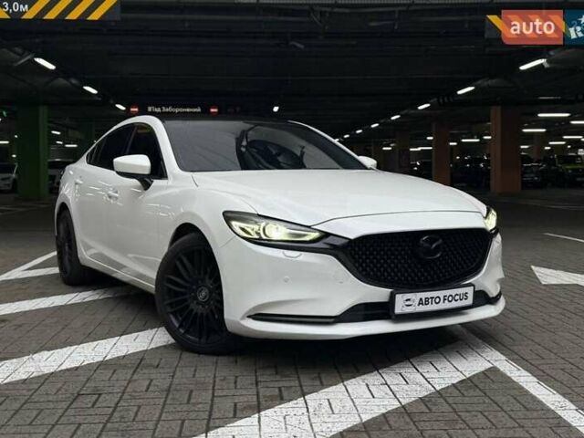 Белый Мазда 6, объемом двигателя 2 л и пробегом 121 тыс. км за 17990 $, фото 1 на Automoto.ua