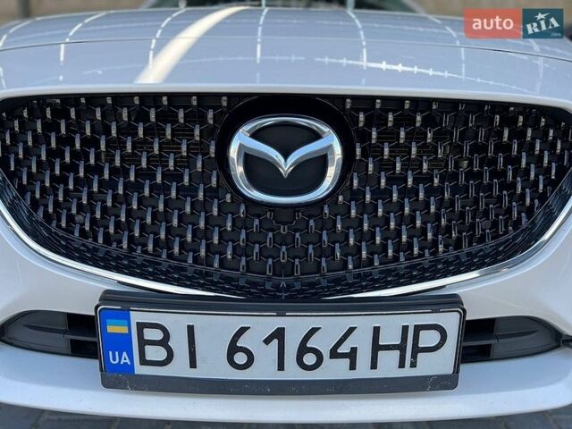 Белый Мазда 6, объемом двигателя 2 л и пробегом 107 тыс. км за 18600 $, фото 1 на Automoto.ua