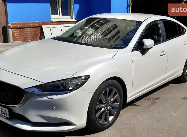 Белый Мазда 6, объемом двигателя 2 л и пробегом 112 тыс. км за 16500 $, фото 1 на Automoto.ua