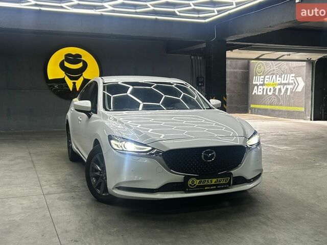Белый Мазда 6, объемом двигателя 2 л и пробегом 169 тыс. км за 17900 $, фото 1 на Automoto.ua