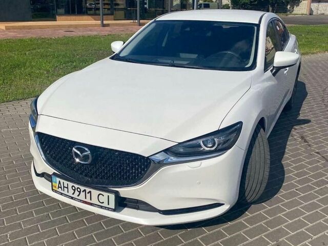 Білий Мазда 6, об'ємом двигуна 2 л та пробігом 20 тис. км за 18800 $, фото 1 на Automoto.ua