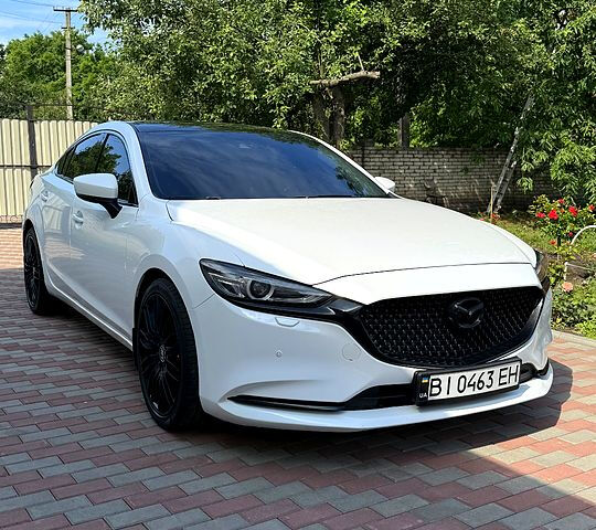 Белый Мазда 6, объемом двигателя 2 л и пробегом 113 тыс. км за 18000 $, фото 1 на Automoto.ua