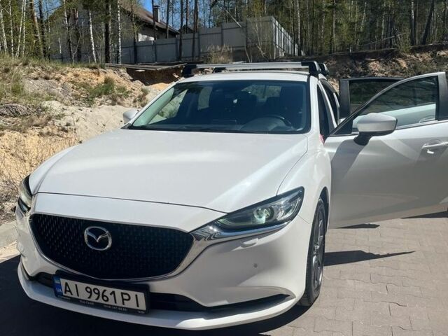 Білий Мазда 6, об'ємом двигуна 2 л та пробігом 126 тис. км за 18000 $, фото 1 на Automoto.ua