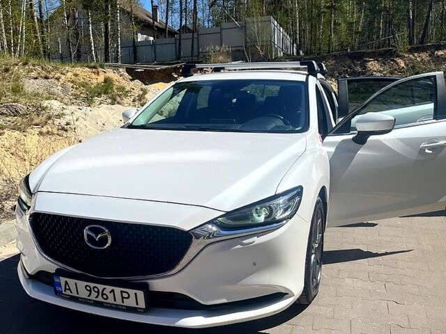 Білий Мазда 6, об'ємом двигуна 2 л та пробігом 126 тис. км за 21000 $, фото 1 на Automoto.ua
