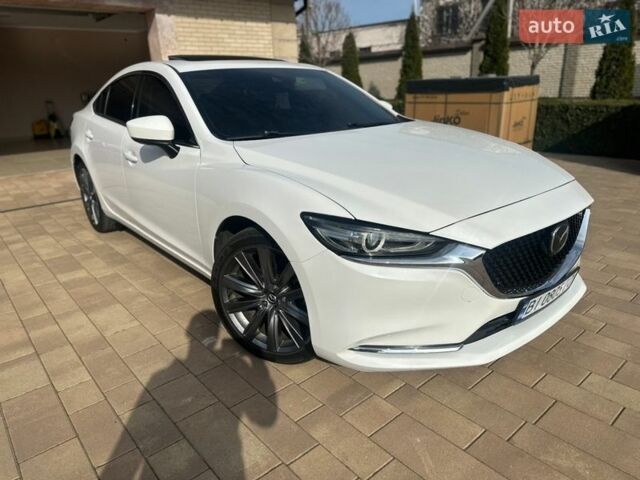 Белый Мазда 6, объемом двигателя 2.5 л и пробегом 114 тыс. км за 17900 $, фото 1 на Automoto.ua