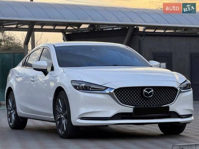 Белый Мазда 6, объемом двигателя 2.5 л и пробегом 80 тыс. км за 15900 $, фото 1 на Automoto.ua