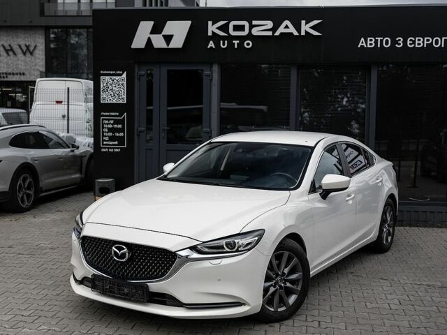 Белый Мазда 6, объемом двигателя 2 л и пробегом 144 тыс. км за 17990 $, фото 1 на Automoto.ua