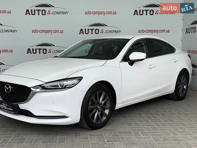 Белый Мазда 6, объемом двигателя 2.49 л и пробегом 74 тыс. км за 18950 $, фото 1 на Automoto.ua