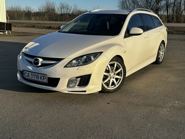 Белый Мазда 6, объемом двигателя 2 л и пробегом 206 тыс. км за 7300 $, фото 1 на Automoto.ua