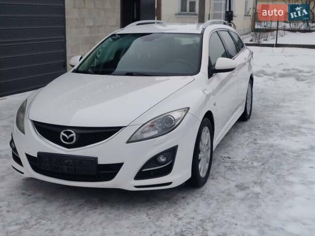 Белый Мазда 6, объемом двигателя 2 л и пробегом 210 тыс. км за 8500 $, фото 1 на Automoto.ua