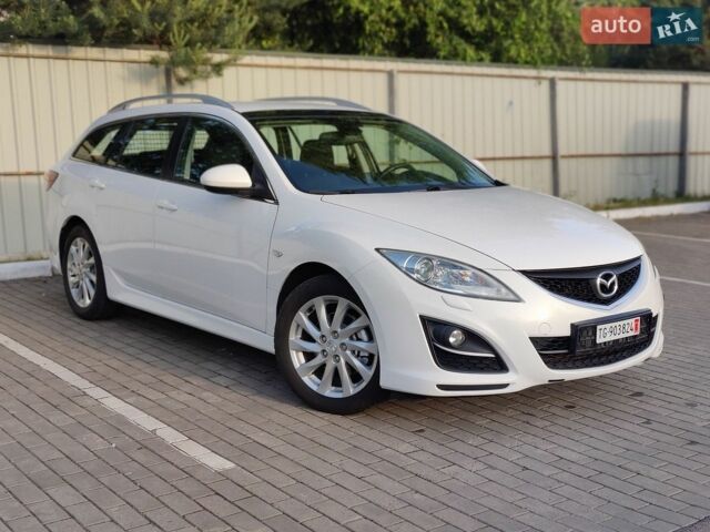 Белый Мазда 6, объемом двигателя 2 л и пробегом 211 тыс. км за 8200 $, фото 1 на Automoto.ua