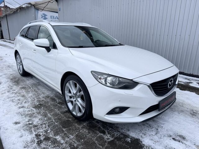 Белый Мазда 6, объемом двигателя 2.2 л и пробегом 199 тыс. км за 11950 $, фото 1 на Automoto.ua