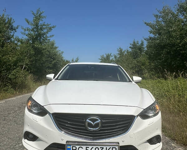 Білий Мазда 6, об'ємом двигуна 2.19 л та пробігом 235 тис. км за 11200 $, фото 1 на Automoto.ua