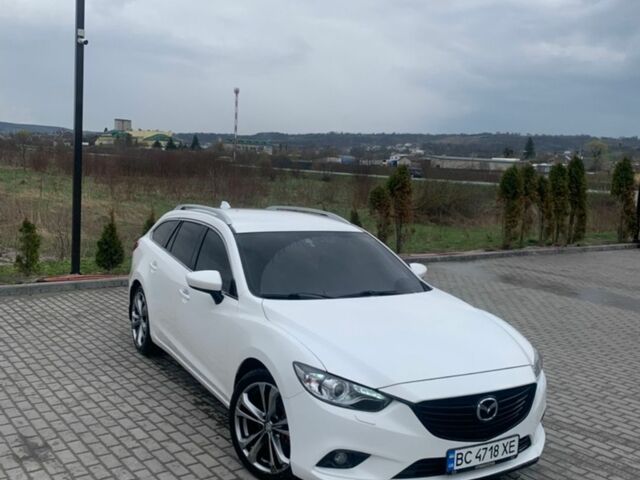 Белый Мазда 6, объемом двигателя 2.18 л и пробегом 252 тыс. км за 9600 $, фото 1 на Automoto.ua