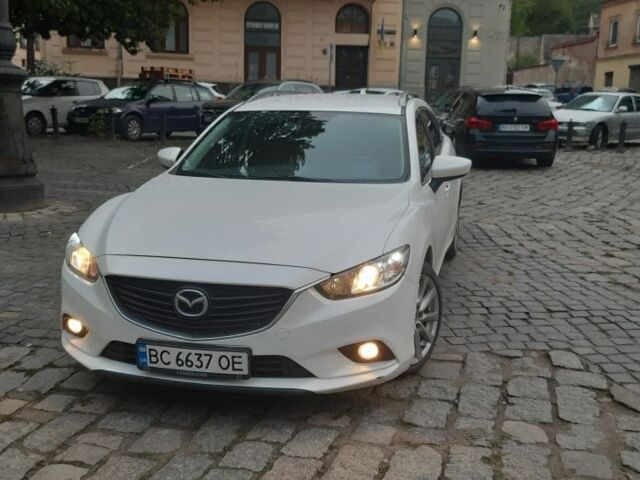 Білий Мазда 6, об'ємом двигуна 2 л та пробігом 268 тис. км за 9471 $, фото 1 на Automoto.ua