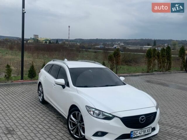 Белый Мазда 6, объемом двигателя 2.18 л и пробегом 252 тыс. км за 10400 $, фото 1 на Automoto.ua