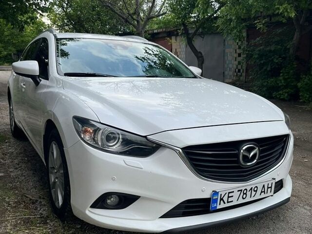 Белый Мазда 6, объемом двигателя 2.18 л и пробегом 259 тыс. км за 12200 $, фото 1 на Automoto.ua
