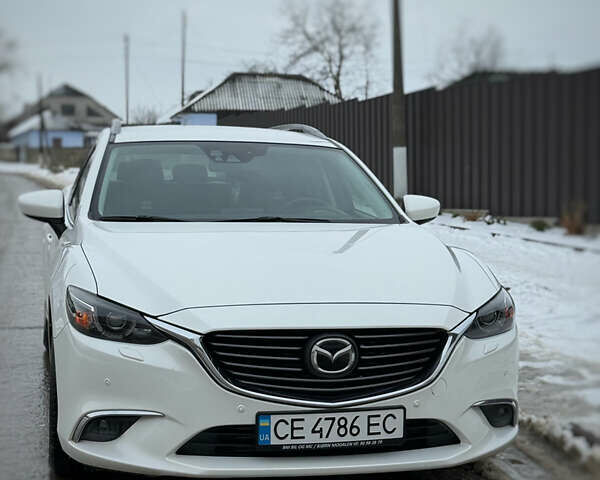 Белый Мазда 6, объемом двигателя 2.2 л и пробегом 197 тыс. км за 14999 $, фото 1 на Automoto.ua