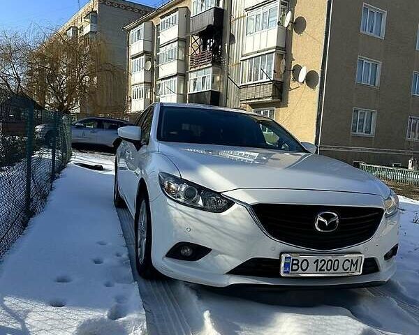 Білий Мазда 6, об'ємом двигуна 2.2 л та пробігом 215 тис. км за 12500 $, фото 1 на Automoto.ua