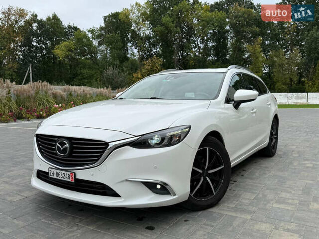 Белый Мазда 6, объемом двигателя 2.2 л и пробегом 175 тыс. км за 11500 $, фото 1 на Automoto.ua