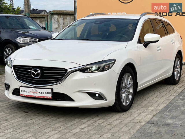 Білий Мазда 6, об'ємом двигуна 2 л та пробігом 130 тис. км за 16700 $, фото 1 на Automoto.ua