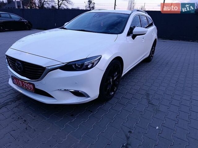 Белый Мазда 6, объемом двигателя 2.2 л и пробегом 177 тыс. км за 12900 $, фото 1 на Automoto.ua