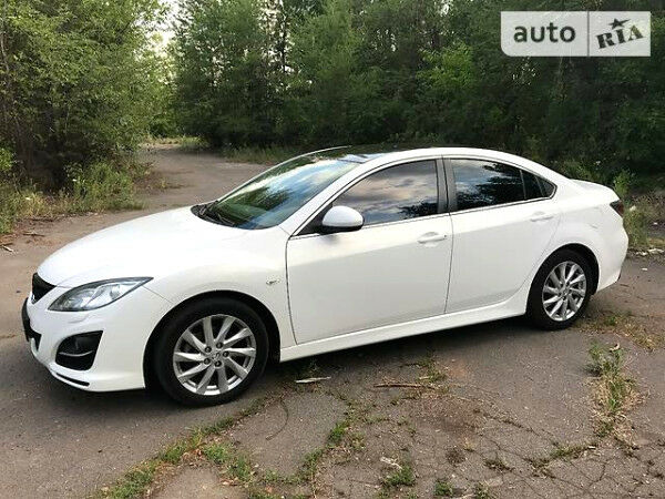 Білий Мазда 6, об'ємом двигуна 2 л та пробігом 130 тис. км за 13600 $, фото 1 на Automoto.ua