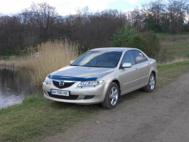 Бежевий Мазда 6, об'ємом двигуна 2 л та пробігом 250 тис. км за 3488 $, фото 1 на Automoto.ua