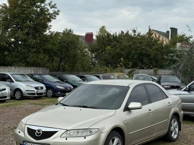 Бежевий Мазда 6, об'ємом двигуна 2 л та пробігом 256 тис. км за 3750 $, фото 1 на Automoto.ua